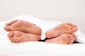 Feet in bed
