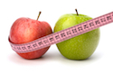 Apples being measured