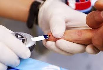 Finger pricked for blood test
